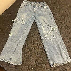 Women's Distressed Blue Jeans